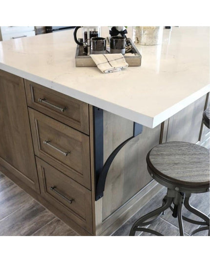 Syracuse black metal countertop support brackets by Industrial Farm Co installed under white quartz kitchen island with wo...