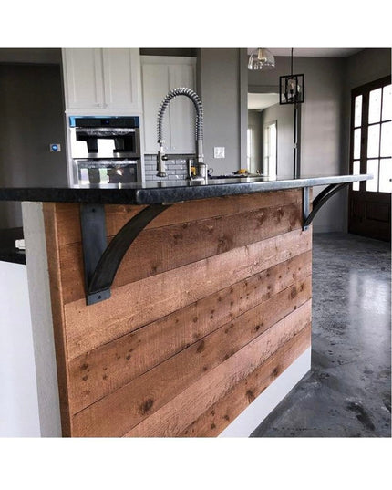 Black metal Lexica 4 inch wide shelf supports mounted under reclaimed wood kitchen island countertop by Industrial Farm Co