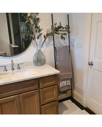 Black metal decorative ladder with gray towels displayed in modern bathroom next to wood vanity - The Lynn Metal Ladder by...