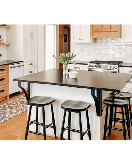 Black metal Syracuse countertop support brackets from Industrial Farm Co supporting kitchen island with dark countertop an...