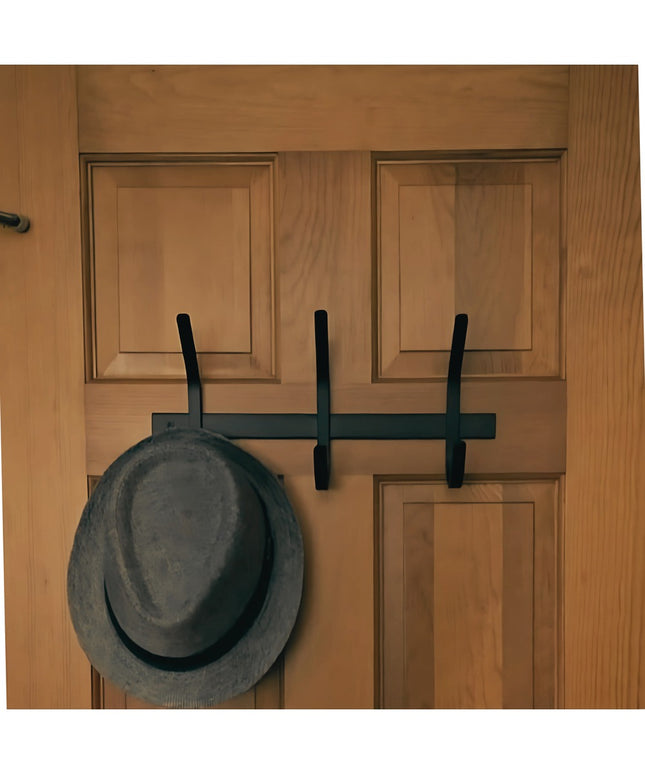 Industrial Farm Co Meredith Petite Double J black metal coat rack mounted on natural wood door with gray hat hanging
