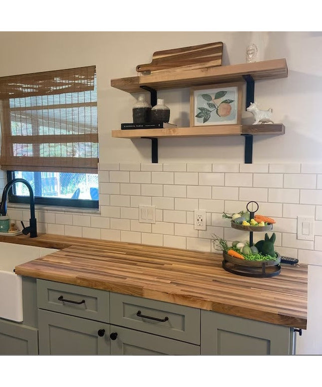 Black metal L-shaped shelf brackets supporting natural wood floating shelves in modern farmhouse kitchen with subway tile ...