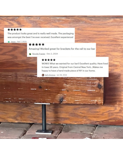 Black metal bar foot rail bracket mounted on rustic reclaimed wood planks with customer reviews showing 5-star ratings for...