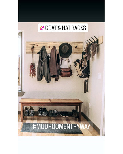 Rustic wooden Eastman Coat & Hook Rack mounted on white wall with jackets, hat, and bag hanging, wooden bench with shoes b...