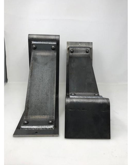 Two black metal Monroe Style Corbel Brackets by Industrial Farm Co showing welded steel construction with mounting holes a...