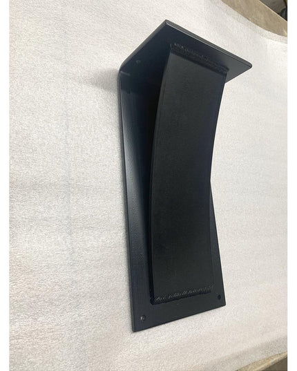 Black curved metal bar shelf bracket corbel support from Industrial Farm Co displayed on white textured surface