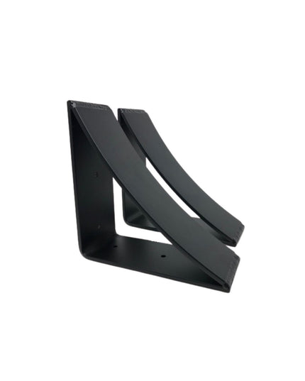 Black steel minimal triangular shelf brackets by Industrial Farm Co, featuring clean geometric design with mounting holes ...
