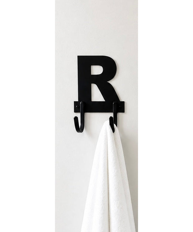 Black metal letter R wall hook with two hanging hooks holding white towel on white wall - Industrial Farm Co personalized ...