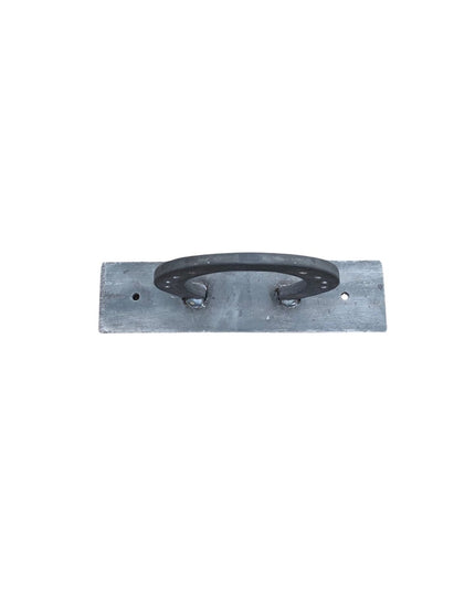 The Ginger handmade steel horseshoe towel holder by Industrial Farm Co mounted on rustic gray wood plank with black metal ...