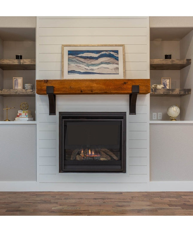 Kudlick Farmhouse black metal mantel brackets supporting reclaimed wood beam above white shiplap fireplace surround by Ind...