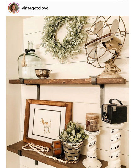 Rustic wood shelves with black metal Abbey Z Style Shelf Brackets by Industrial Farm Co, displaying vintage decor includin...