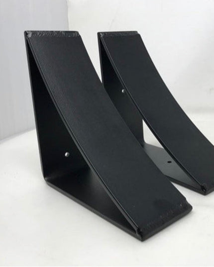 Two black powder-coated steel Eleanor Minimal Brackets by Industrial Farm Co displaying curved triangular design with moun...
