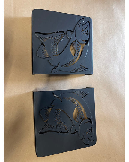 Black metal Vandiver Trout Mantel End Caps by Industrial Farm Co featuring cut-out trout fish designs on square plates