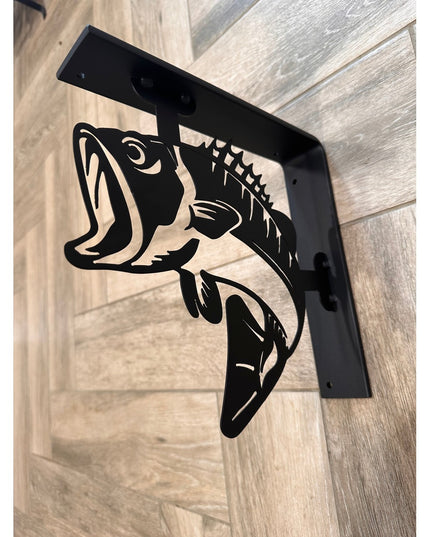 Black metal shelf bracket with cut-out bass fish design by Industrial Farm Co, showing decorative support mounted on wood ...