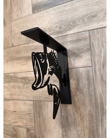 Black metal shelf bracket with bass fish cutout design mounted on light wood grain surface, Industrial Farm Co custom deco...