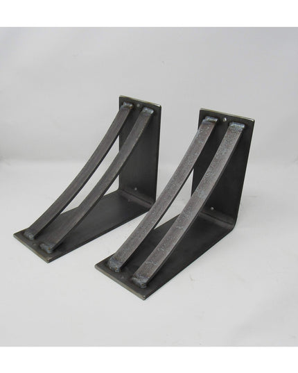 Two black metal industrial corbel brackets with triangular support design and mounting holes from Industrial Farm Co