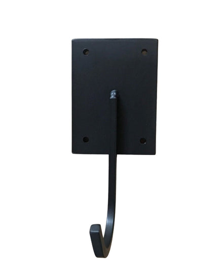 Black metal Marcellus Industrial Hook by Industrial Farm Co with rectangular mounting plate and curved hook arm against wh...