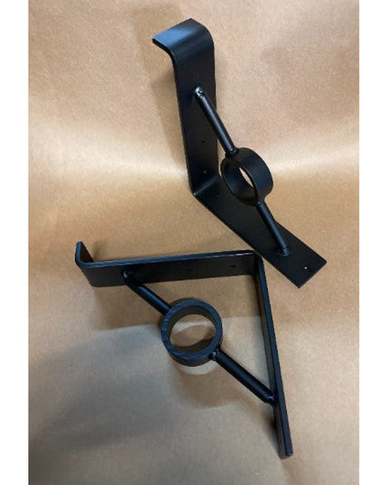 Black metal Simon Decorative Support Bracket by Industrial Farm Co showing two curved wall mount brackets with circular ri...