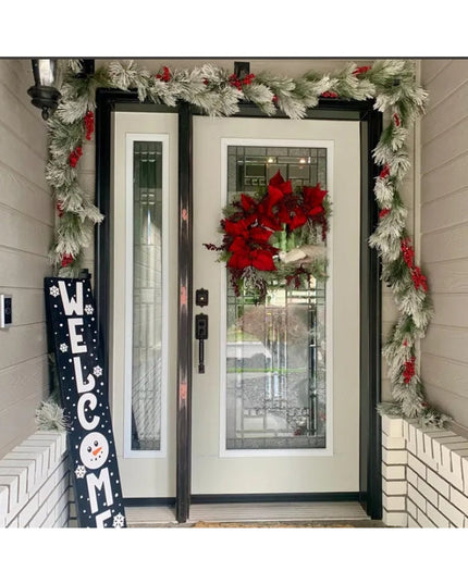 Black industrial-style Marcellus Hook by Industrial Farm Co mounted on white shiplap wall next to decorated front door wit...