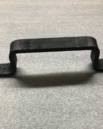Black metal Sagamore Hill Pull door handle with curved design and mounting plates from Industrial Farm Co on textured surface