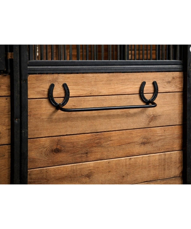 Black metal horseshoe towel bar mounted on wooden stable wall - The Donahue Horseshoe Blanket & Towel Bar by Industrial Fa...