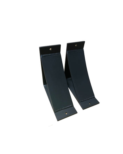Two black metal Lexica 4 Inch Wide Supports shelf brackets by Industrial Farm Co, showing curved L-shaped design with moun...
