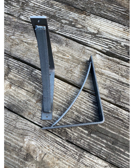 Industrial Farm Co Rey Bracket Support in black metal with triangular design shown on weathered wood planks