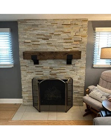 Rustic wooden Otisco Farmhouse Style Bracket corbels supporting mantel beam on stacked stone fireplace by Industrial Farm Co