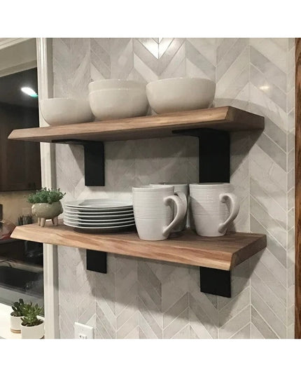 Heavy duty black steel L shelf brackets supporting natural wood floating shelves with white dishes and bowls in modern kit...