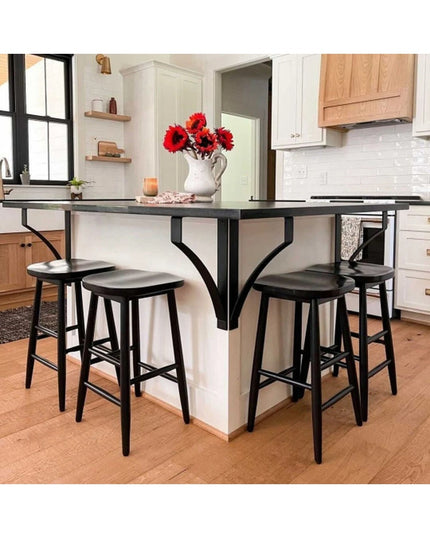 Black metal Syracuse countertop support brackets by Industrial Farm Co holding up dark kitchen island with bar stools in m...