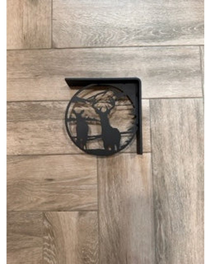 Black metal L-bracket shelf support with deer silhouette cutout design mounted on light wood planks by Industrial Farm Co
