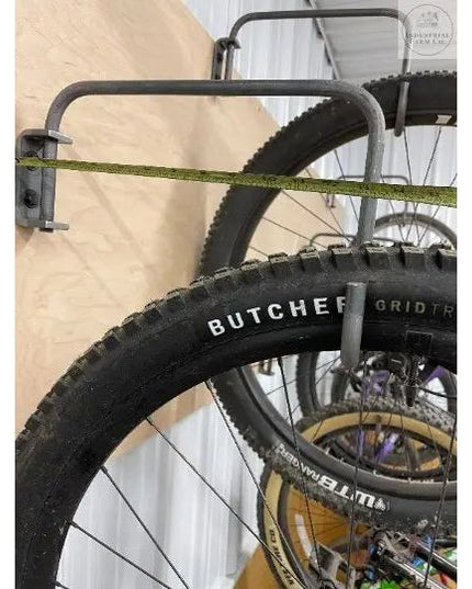The Logan Wall Mounted Bike Rack Hook Fat Bike Rim Finish Copper Powder Coat | Industrial Farm Co